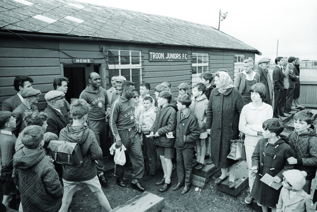 Pele leads out the Brazil team for a friendly at Portland Park, Troon, in preparation for the 1966 World Cup